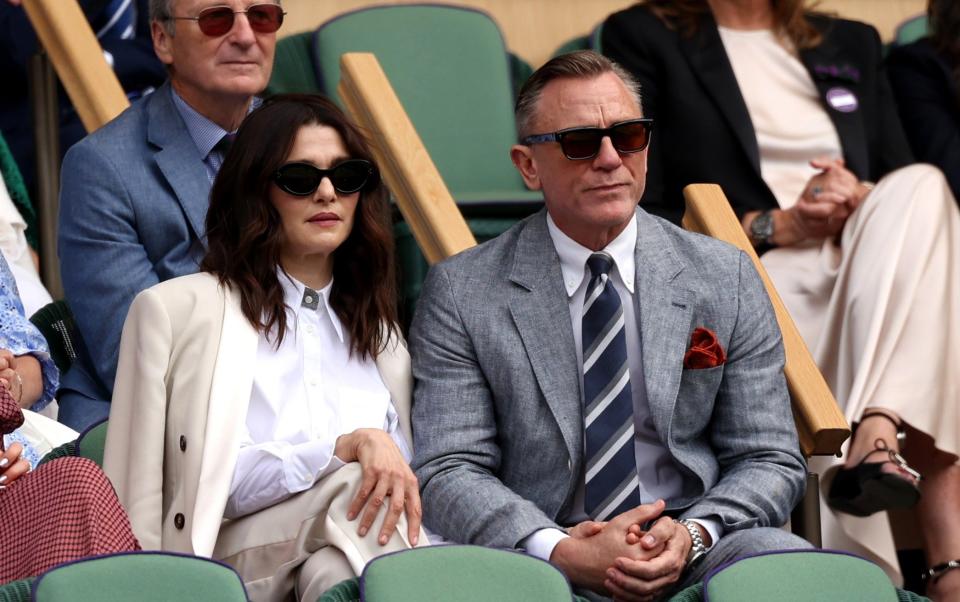 Actors, Daniel Craig (R) and Rachel Weisz (L) are seen in the Royal Box during the Men's Singles Final between Novak Djokovic of Serbia and Carlos Alcaraz of Spain