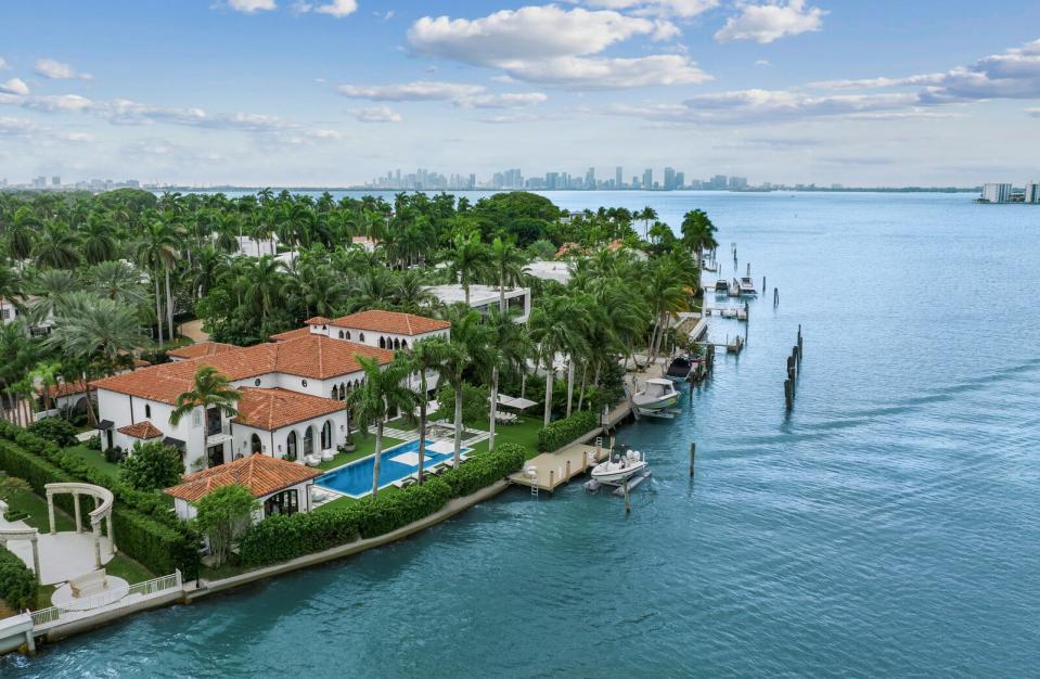 The sprawling home sits inches from the island's pristine coastline, offering unobstructed waterfront views. Popular nightlife hotspots of South Beach are just five miles away.