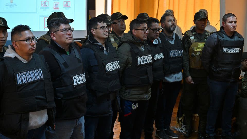 Multiple Bolivian military members are escorted by police following their arrest in La Paz, Bolivia on June 27, 2024. - Aizar Raldes/AFP/Getty Images