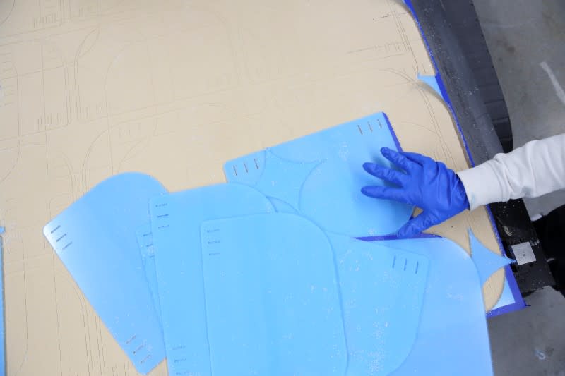 Workers at Bednark produce medical face shields, as the demand for their production rapidly increased