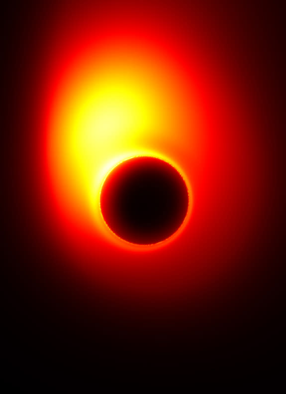 This image from a simulation shows an energy jet launched from a spinning black hole surrounded by a disk of accreting material. The black hole is spinning at half the maximum rate, and its mass is that of the black hole at the center of the M