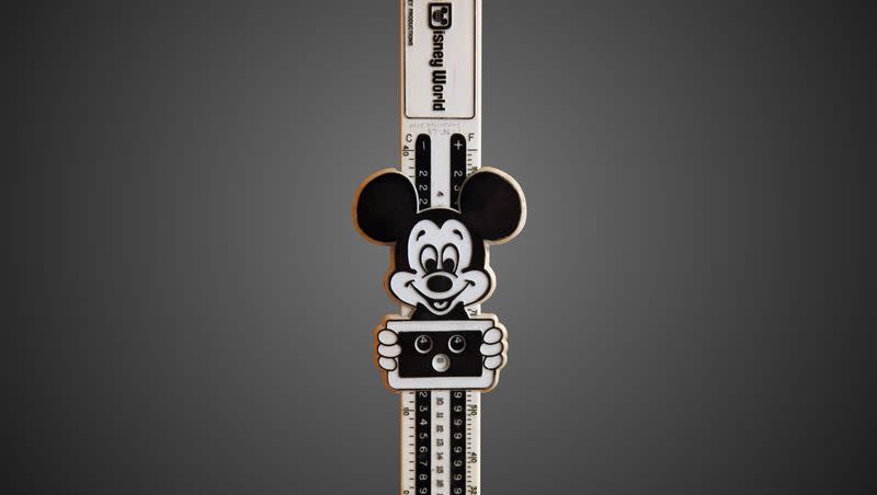 Mickey Mouse on a slide rule.