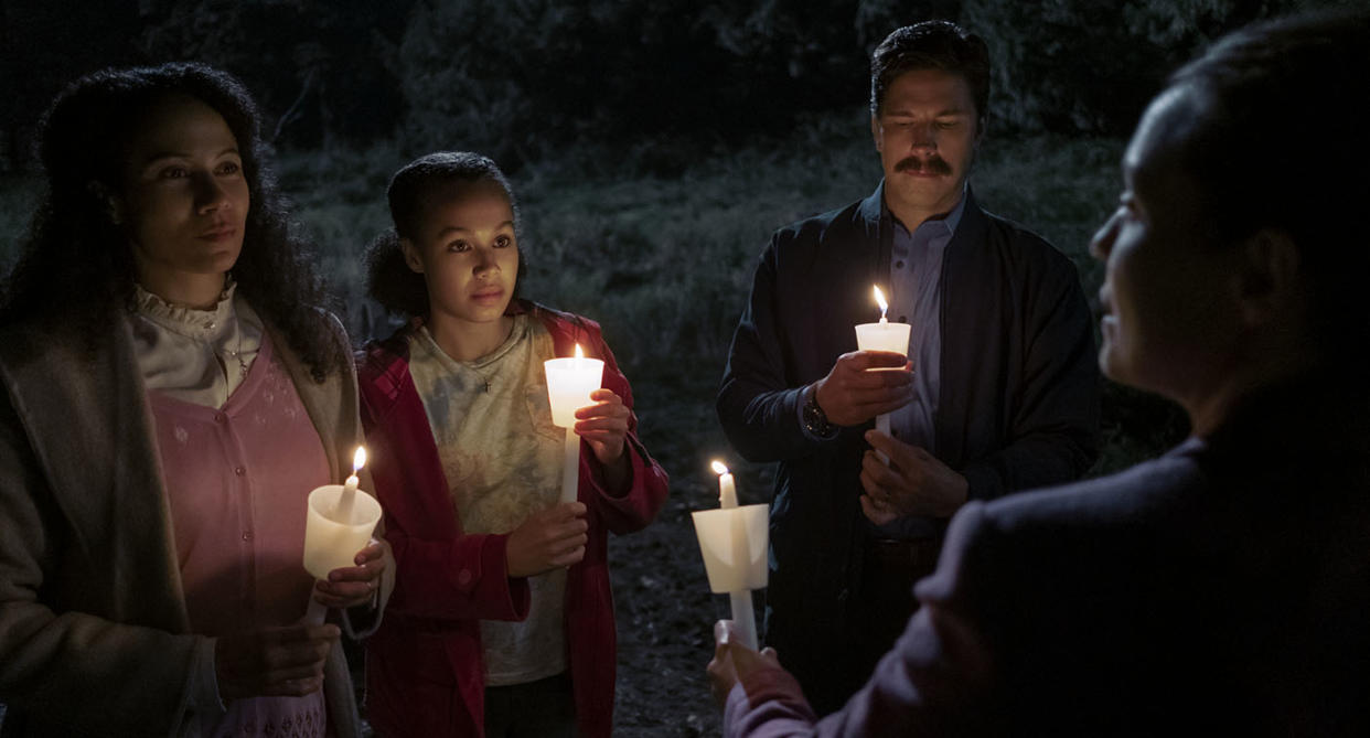 MIDNIGHT MASS (L to R) CRYSTAL BALINT as DOLLY SCARBOROUGH, ANNARAH CYMONE as LEEZA SCARBOROUGH, MICHAEL TRUCCO as WADE SCARBOROUGH, and SAMANTHA SLOYAN as BEV KEANE in episode 106 of MIDNIGHT MASS Cr. EIKE SCHROTER/NETFLIX Â© 2021