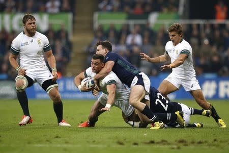 Rugby Union - South Africa v Scotland - IRB Rugby World Cup 2015 Pool B - St James' Park, Newcastle, England - 3/10/15 South Africa's Jesse Kriel in action with Scotland's Matt Scott (top) and Sean Lamont Reuters / Phil Noble