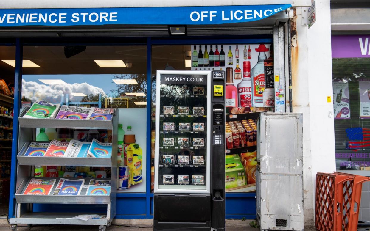 A face mask vending machine on Chigwell High Road - - GEOFF PUGH