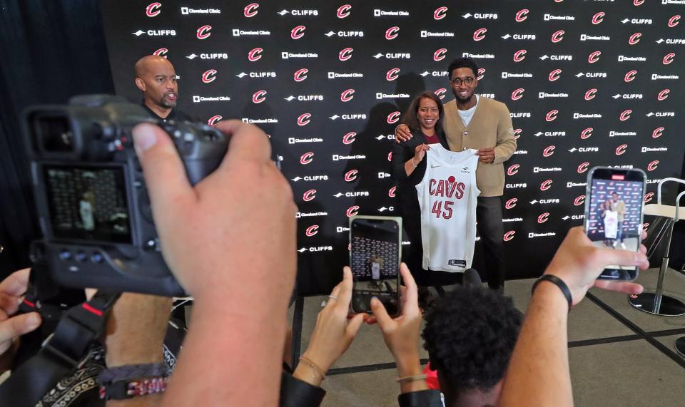 Cleveland Cavaliers guard Donovan Mitchell poses for photographs with his mother, Nicole, after his introductory press conference at Rocket Mortgage FieldHouse, Wednesday, Sept. 14, 2022, in Cleveland, Ohio.