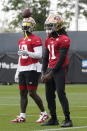 San Francisco 49ers wide receivers Deebo Samuel, left, and Brandon Aiyuk take part in an NFL football practice in Santa Clara, Calif., Tuesday, June 6, 2023. (AP Photo/Jeff Chiu)