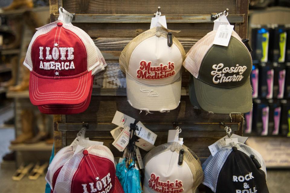 Hats hang at Boot Barn, located at 112 Walker Springs Road in West Knoxville, Friday, May 21, 2021. Boot Barn, which operates over 250 locations in 30 states, opened its newest Knoxville location in March. 