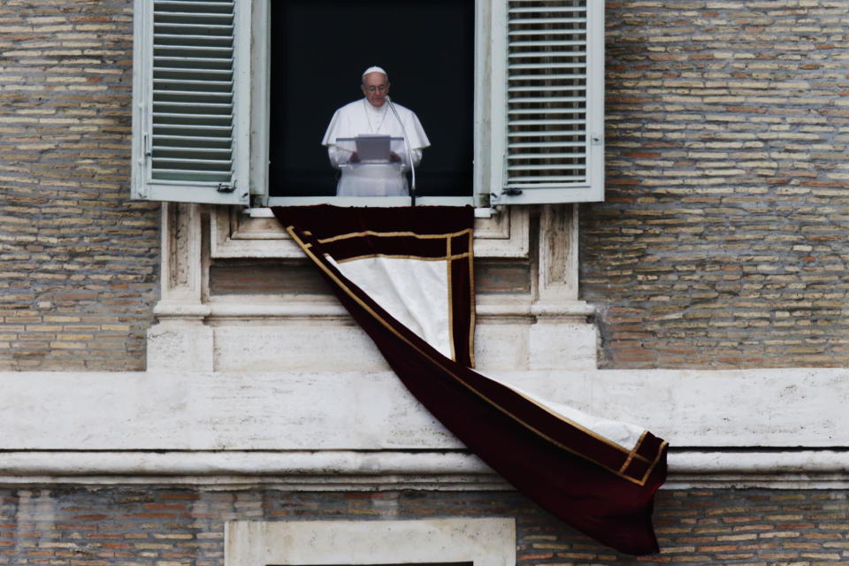 Pope Francis recites the Angelus prayer to the crowd in St. Peter's Square at the Vatican, Sunday, March 17, 2013.(AP Photo/Dmitry Lovetsky)