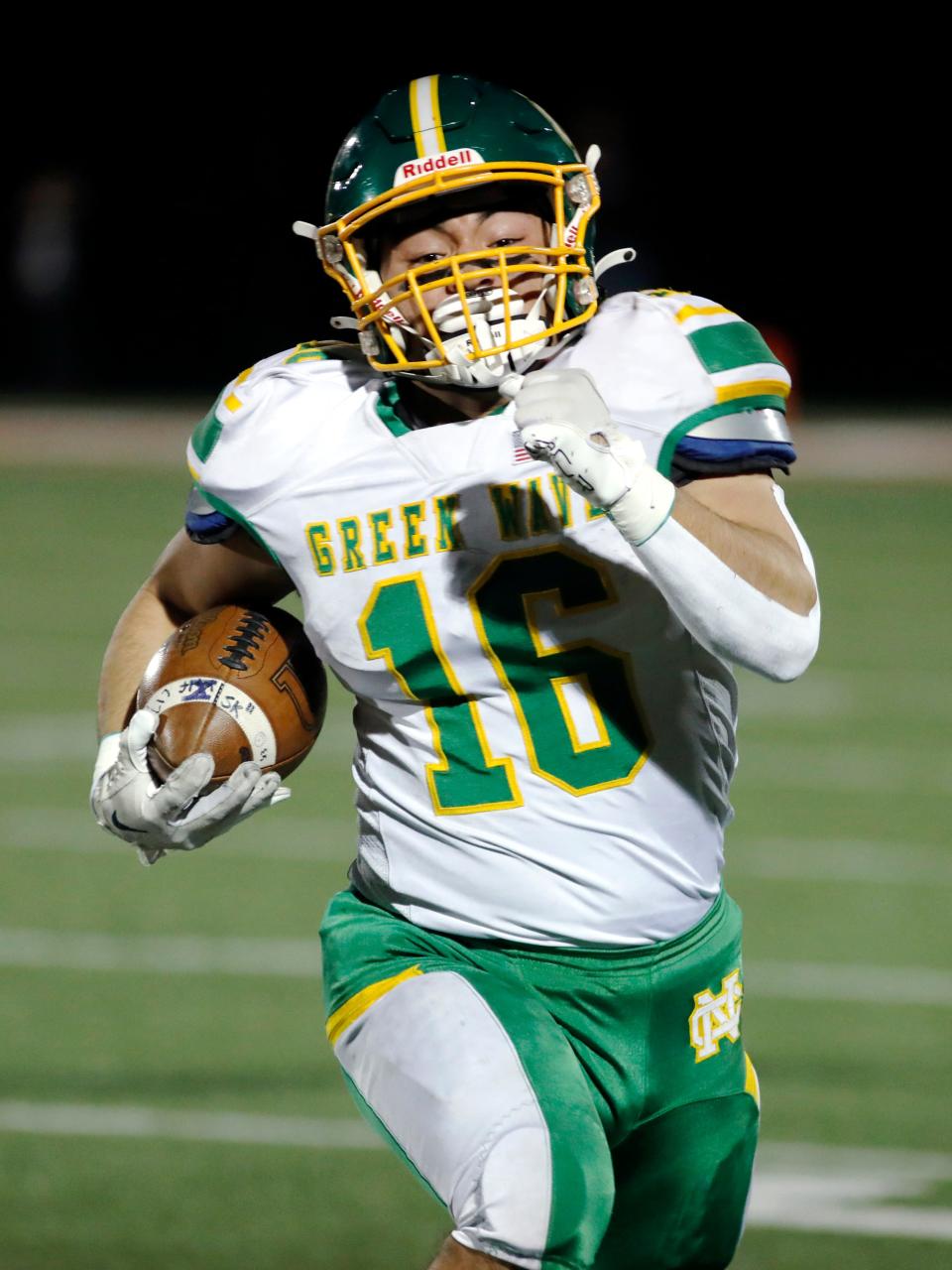 Newark Catholic's Mason Hackett breaks off a run during the first quarter of a Division VII state semifinal on Saturday, Nov. 26, 2022, at Red Rider Stadium in Orrville.