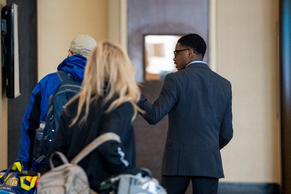 Mar 29, 2024; Teaneck, N.J., United States; Alfred Lewis, 17, is a senior at Teaneck High School and works at the Glenpointe Marriott as part of a paid work-study program. Lewis shows customers the way to the elevator.