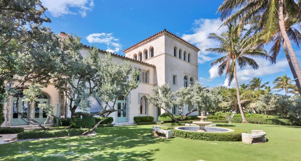 Windows and French doors look out to the lawn and the Atlantic Ocean at 550 S. Ocean Blvd. in Palm Beach. The landmarked house sold in January for a recorded $44.975 million.