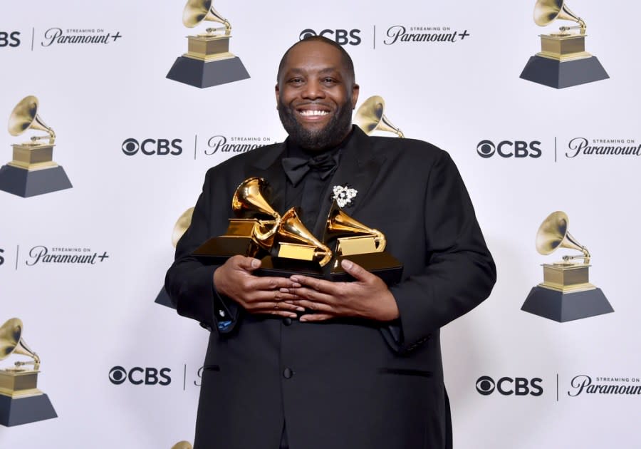 Killer Mike poses in the press room with the awards for best rap performance and best rap song for “Scientists & Engineers,” and best rap album for “Michael” during the 66th annual Grammy Awards on Sunday, Feb. 4, 2024, in Los Angeles. (Photo by Richard Shotwell/Invision/AP)