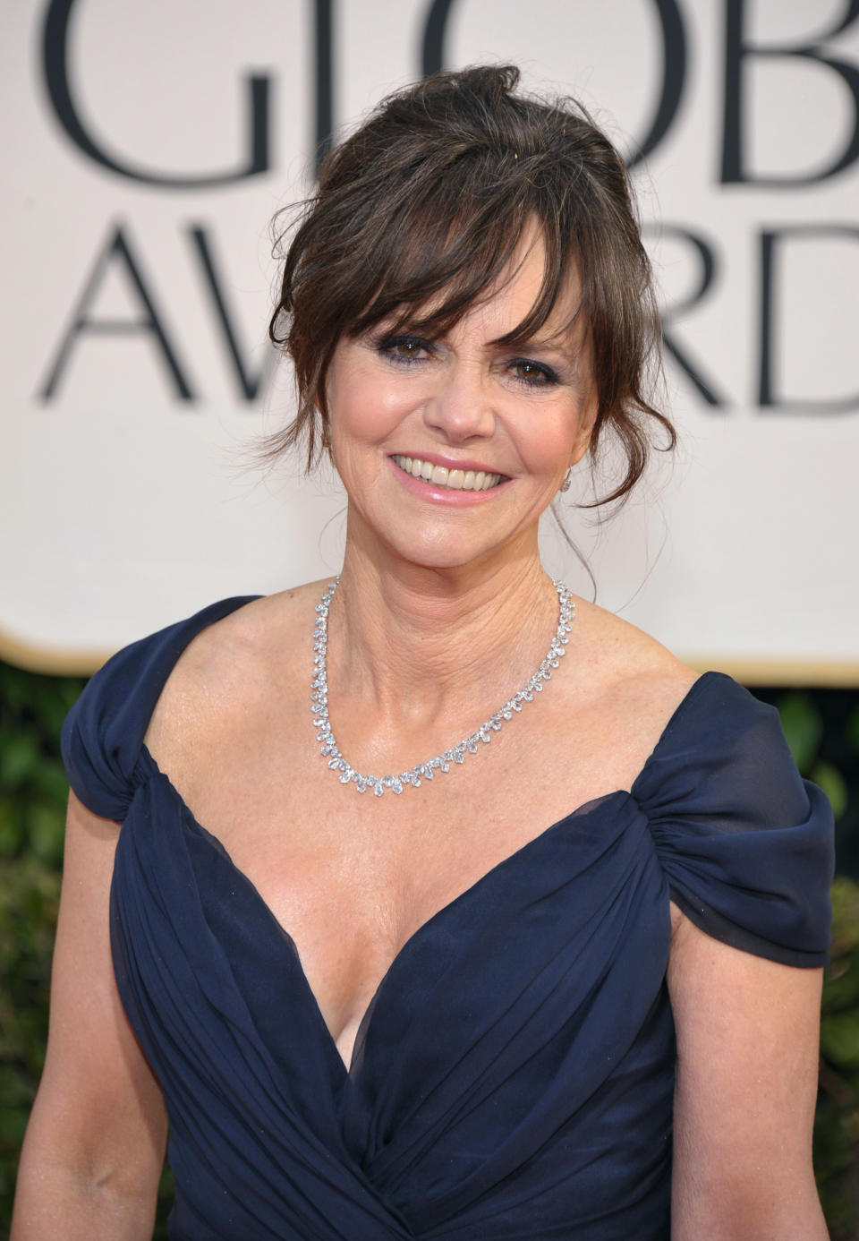 FILE - In this Jan. 13, 2013 file photo, Actress Sally Field arrives at the 70th Annual Golden Globe Awards at the Beverly Hilton Hotel, in Beverly Hills, Calif. Actors and actresses compete separately at awards shows, a tradition some in the industry consider vital for women but others question. (Photo by John Shearer/Invision/AP, File)