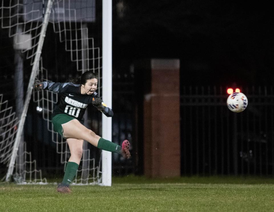 Crusaders Lily Rodriguez (00) boots the ball up the pitch during the Booker T. Washington vs Catholic girls soccer game at Pensacola Catholic High School in Pensacola on Tuesday, Jan. 10, 2023.