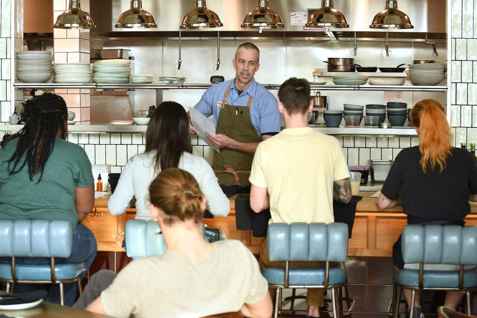 Chef Dean Neff, goes over the menu with his staff at Seabird in downtown Wilmington, NC. Neff who was recently long-listed for Outstanding Chef in the James Beard Awards is one of the few NC chefs to receive this honor. KEN BLEVINS/STARNEWS