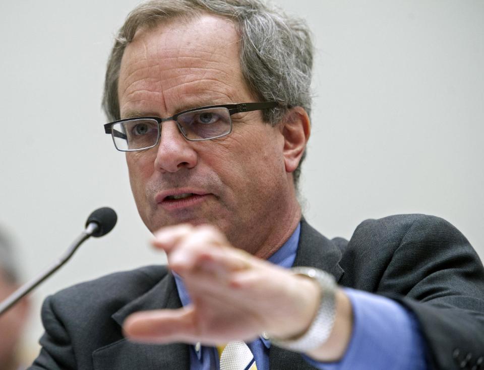 FILE - In this Feb. 4, 2014, file photo, Peter Swire, of the Review Group on Intelligence and Communications Technology, testifies before the House Judiciary Committee's hearing on Recommendations to Reform FISA Authorities, on Capitol Hill in Washington. A massive data breach at Target Corp. that exposed tens of millions of credit card numbers has focused attention on a patchwork of state consumer notification laws and renewed a push for a single national standard. "We’re stuck with the state-by-state approach unless some compromise gets done at the federal level," said Swire, a privacy expert at Georgia Tech and a former White House privacy official.(AP Photo/Cliff Owen, File)