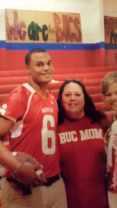 As Cowboys quarterback Dak Prescott (left) grew up, his mother Peggy was always cheering him on — and letting him know how he could play even better. (Courtesy Valrie Gilbeaux)