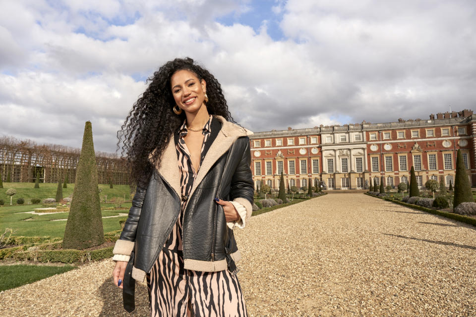 TV presenter Vick Hope at Hampton Court Palace in London, where Bridgerton was filmed. (SWNS)