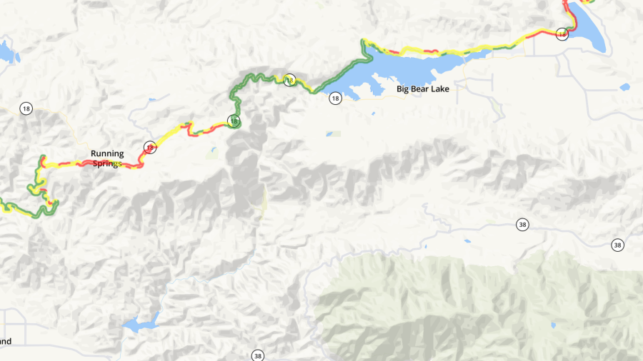 A map shows the closure of Highway 18 from Snow Valley to Big Bear dam and the suggested route 38 to the south.