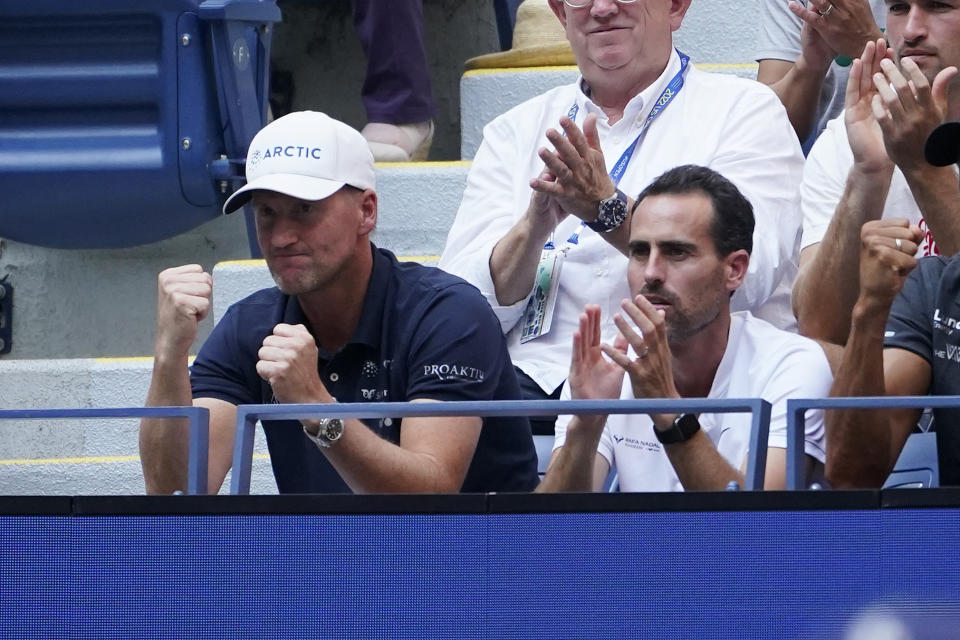Coach Christian Ruud, left, reacts while watching his son Casper Ruud, of Norway, compete against Karen Khachanov, of Russia, during the semifinals of the U.S. Open tennis championships, Friday, Sept. 9, 2022, in New York. (AP Photo/John Minchillo)