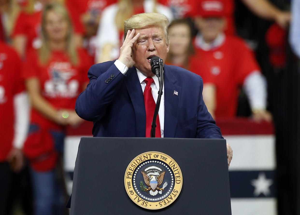 President Donald Trump addresses  a campaign rally Thursday, Oct. 10, 2019, in Minneapolis. (AP Photo/Jim Mone)   