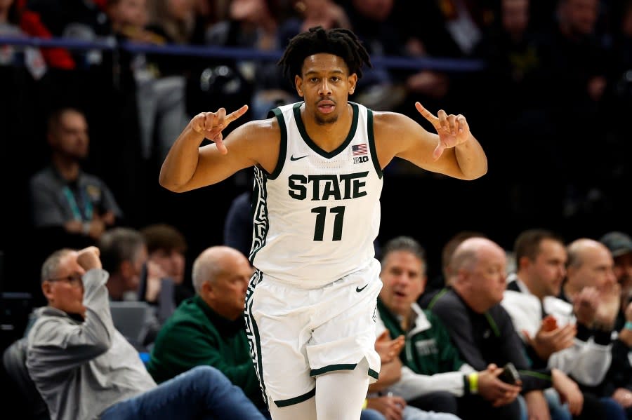 MINNEAPOLIS, MINNESOTA – MARCH 14: A.J. Hoggard #11 of the Michigan State Spartans celebrates his three-point basket against the Minnesota Golden Gophers in the second half in the Second Round of the Big Ten Tournament at Target Center on March 14, 2024 in Minneapolis, Minnesota. The Spartans defeated the Golden Gophers 77-67. (Photo by David Berding/Getty Images)