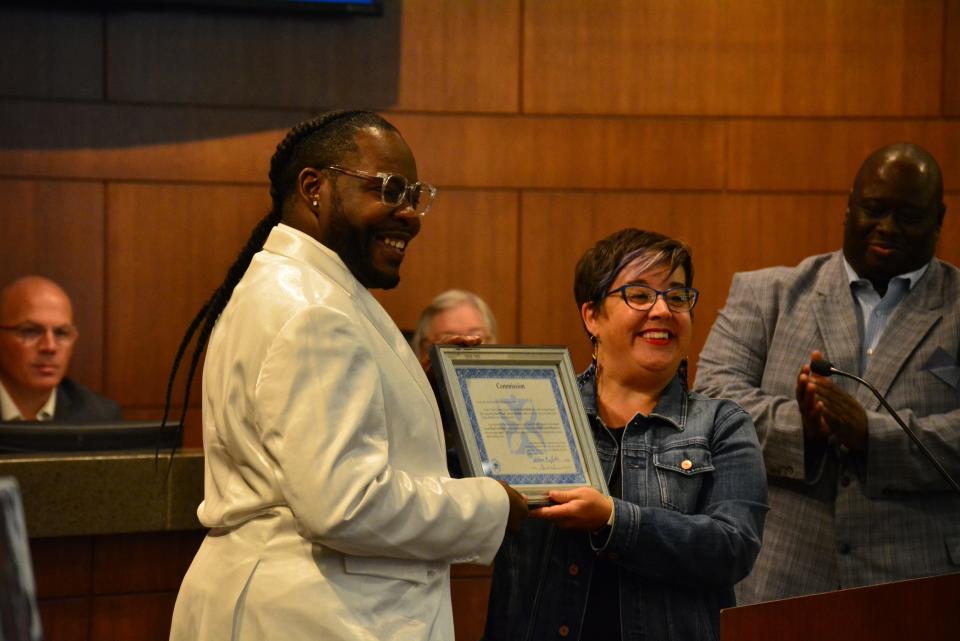 New Third Ward council member Roy Lovelady receives the certification of his seat on the Columbia City Council on Saturday following his swearing-in at Columbia City Hall.