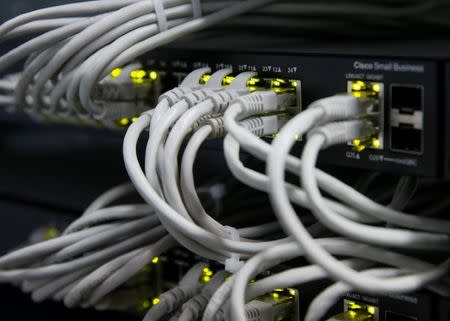 Ethernet cables used for internet connection are seen at the headquarters of the Wnet internet service provider in Kiev, Ukraine July 26, 2017. REUTERS/Valentyn Ogirenko