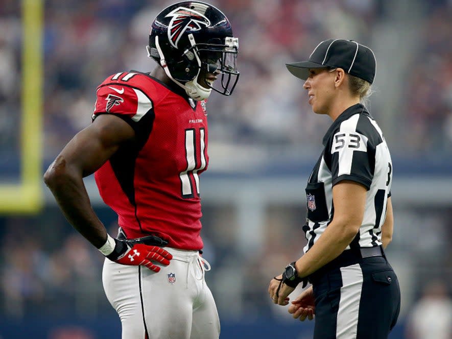 Sarah Thomas speaks to Julio Jones of the Atlanta Falcons in 2015Getty Images