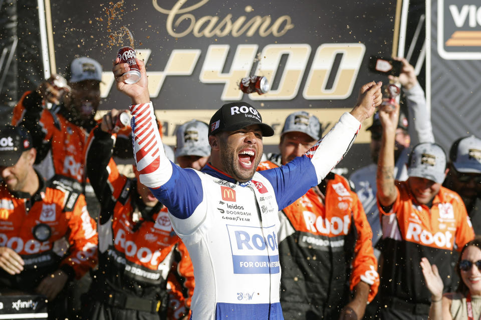 Bubba Wallace celebrates in Victory Lane after winning a NASCAR Cup Series auto race at Kansas Speedway in Kansas City, Kan., Sunday, Sept. 11, 2022. (AP Photo/Colin E. Braley)