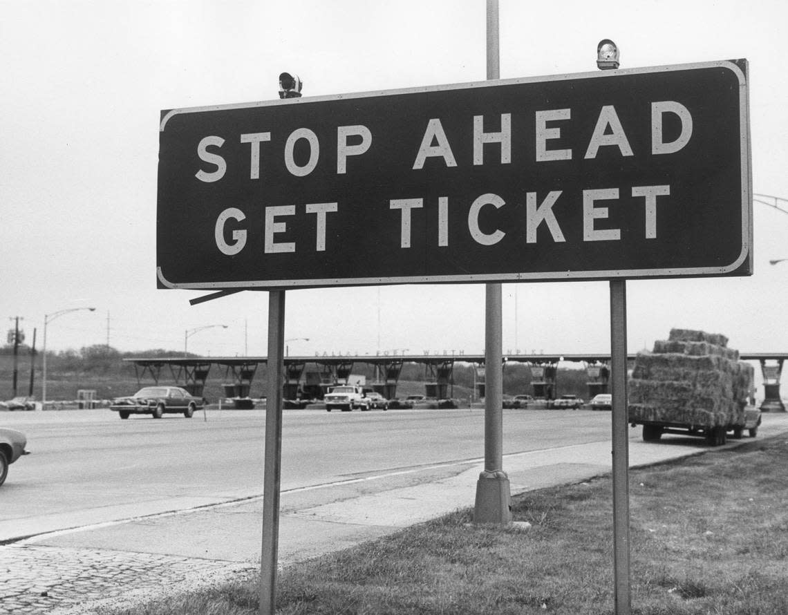 Dec. 30, 1977: A sign at the Dallas-Fort Worth Turnpike toll booths just before it was removed and the highway became the no-charge Interstate 30.