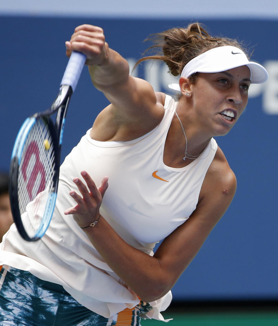 Madison Keys serves to Aleksandra Krunic, of Serbia, during the third round of the U.S. Open tennis tournament, Saturday, Sept. 1, 2018, in New York. (AP Photo/Jason DeCrow)