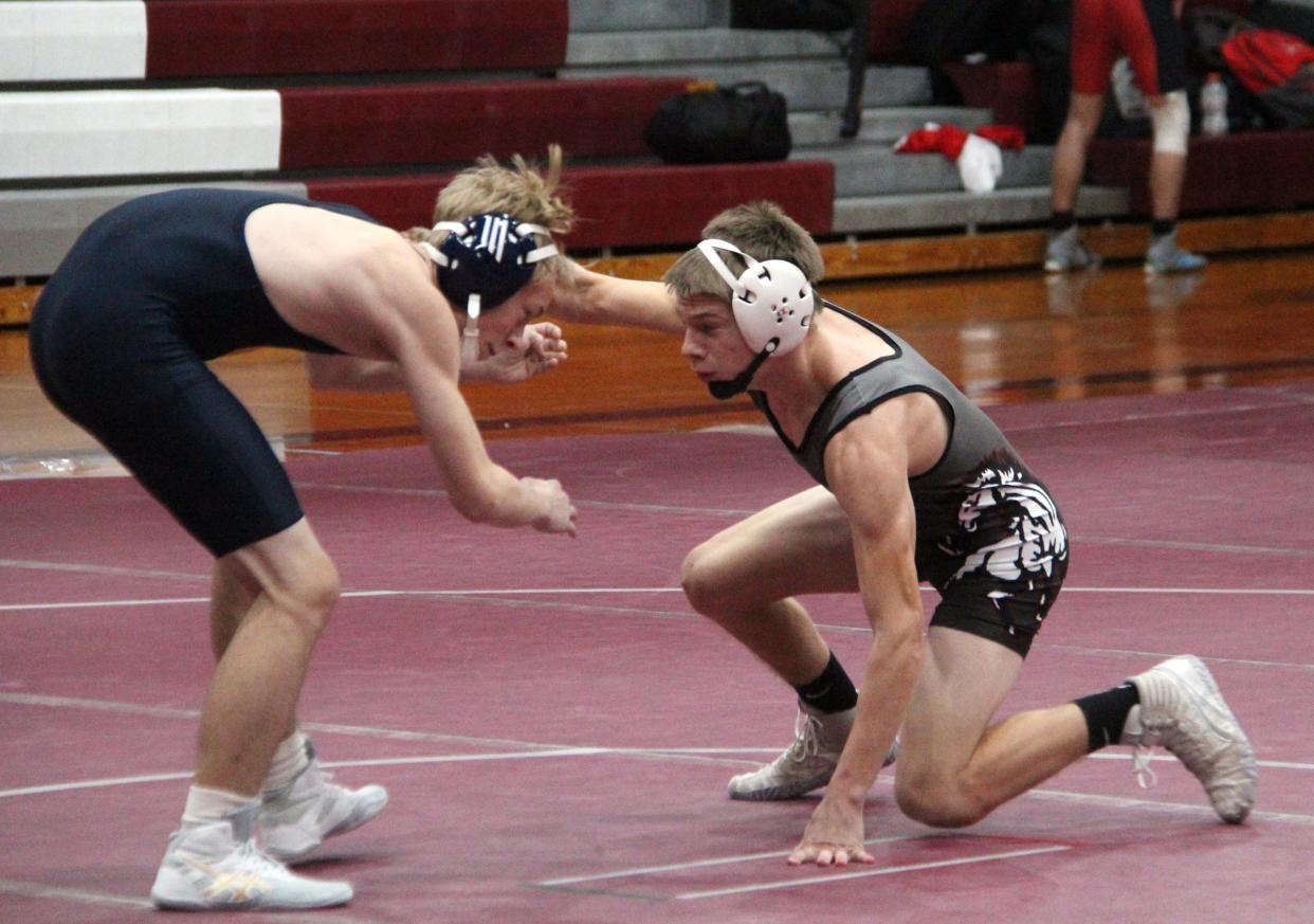 Union City sophomore Landyn Crance sizes up his opponent in season opening action. Crance won via pin fall to start off the 2021-22 campaign