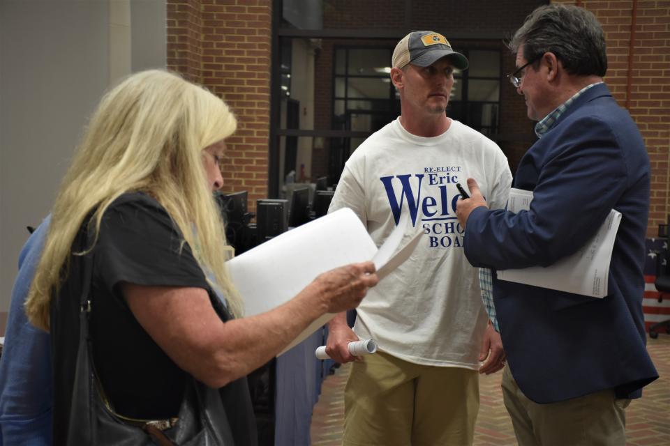 Williamson County School board 2022 District 10 Republican primary winner Eric Welch speaks with Williamson Herald publisher Derby Jones as primary election totals roll into the election commission office on May 3, 2022, in Franklin, Tenn.