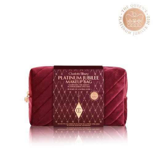 <p><strong>Charlotte Tilbury</strong></p><p>us.charlottetilbury.com</p><p><strong>$40.00</strong></p><p><a href="https://go.redirectingat.com?id=74968X1596630&url=https%3A%2F%2Fwww.charlottetilbury.com%2Fus%2Fproduct%2Fplatinum-jubilee-makeup-bag&sref=https%3A%2F%2Fwww.townandcountrymag.com%2Fsociety%2Ftradition%2Fg39825639%2Fplatinum-jubilee-souvenirs-gifts%2F" rel="nofollow noopener" target="_blank" data-ylk="slk:Shop Now;elm:context_link;itc:0;sec:content-canvas" class="link ">Shop Now</a></p><p>Want to get glam in honor of the Queen? As the official partner of the Queen’s Commemorative Jubilee Pageant Event Charlotte Tilbury is launching a special collection for the jubilee including a lush makeup bag, the brand's famous Magic Cream, and <a href="https://www.townandcountrymag.com/style/beauty-products/g28567503/queen-elizabeth-favorite-beauty-products/" rel="nofollow noopener" target="_blank" data-ylk="slk:three royal-worthy lipsticks;elm:context_link;itc:0;sec:content-canvas" class="link ">three royal-worthy lipsticks</a>. </p>