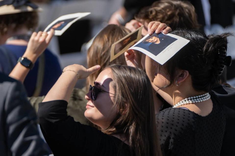 Mourners shade themselves with memorial programs during the service for Sen. Dianne Feinstein at San Francisco City Hall on Thursday. Paul Kitagaki Jr./pkitagaki@sacbee.com