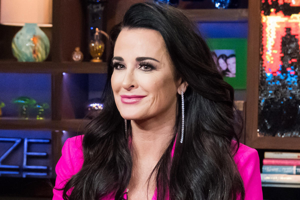 Kyle Richards' Blue Printed Monogrammed Luggage