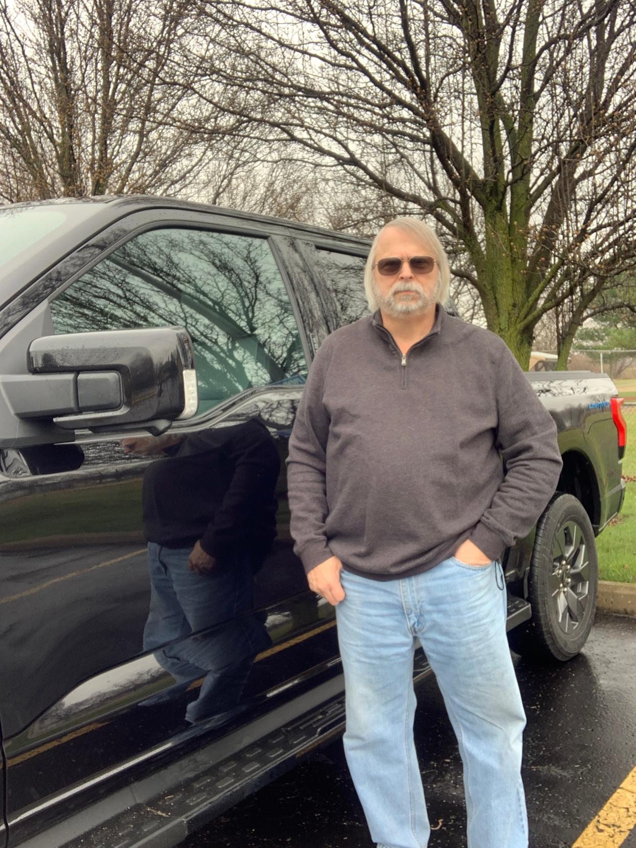 Paul Iacoangeli, of Monroe, seen here with his 2023 Ford F-150 Lightning, owned seven F-Series trucks prior to the all-electric pickup, which he loves. But his experience with the Ford customer service left him feeling so dejected that he plans to buy a GMC.