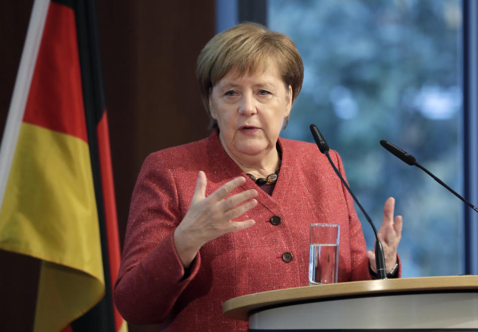 German Chancellor Angela Merkel delivers a speech during the German Ukrainian Economy Forum in Berlin, Germany, Thursday, Nov. 29, 2018. (AP Photo/Michael Sohn)