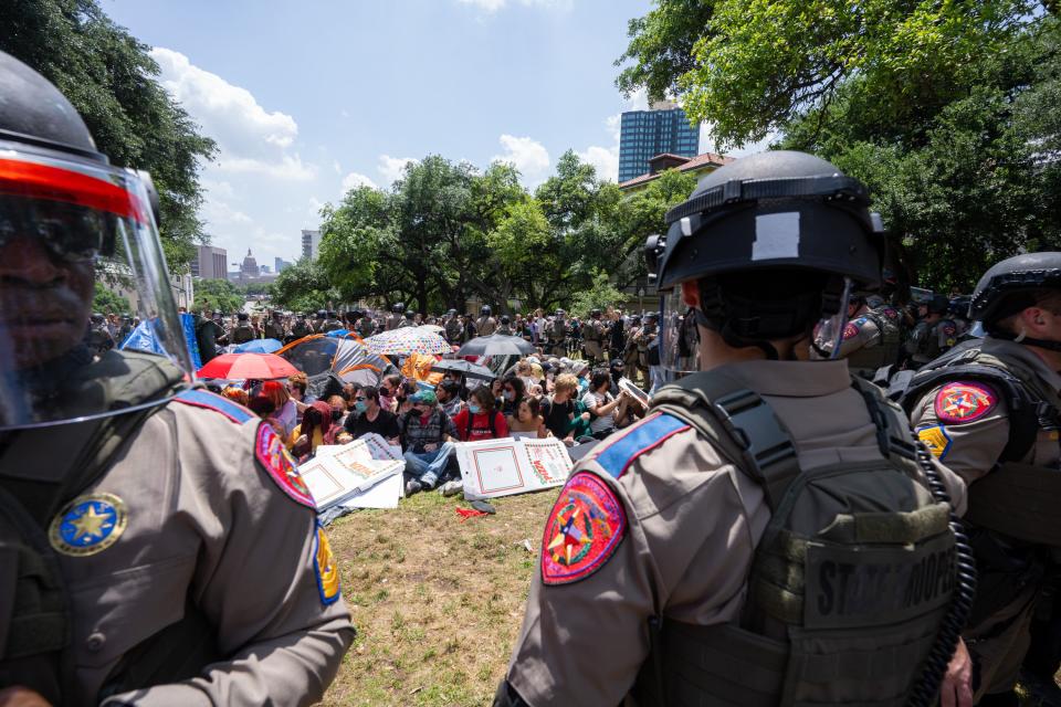Policemen stand guard during a pro-Palestinian protest at the University of Texas at Austin UT Austin in Austin, the United States, April 29, 2024. More than 100 people were arrested as police and pro-Palestinian protesters clashed on the campus of UT Austin on Monday afternoon, local media reported, citing Travis County officials. The officials said the charges could include resisting arrest and assault. (Photo by Christopher Davila/Xinhua via Getty Images)
