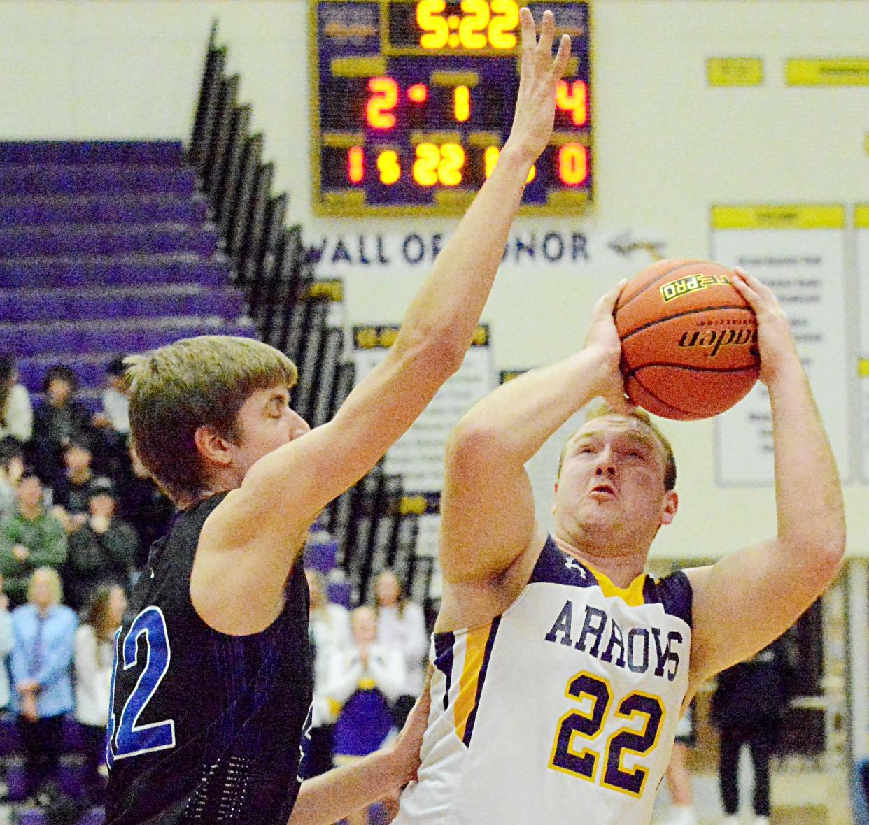 Watertown's Mack Johnson (22) attempts to shoot over Sioux Falls Christian's Nathan Koole during their high school boys basketball game Saturday night in the Civic Arena. Sioux Falls Christian won 64-52.