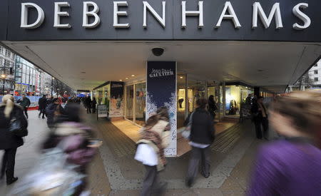 People are seen outside Debenhams department store on Oxford Street in London, Britain in this January 10, 2011, file photo. REUTERS/Ki Price/Files