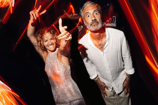 <p>SHUTTERSTOCK</p> Rita Ora and Taika Waititi at his 48th birthday party