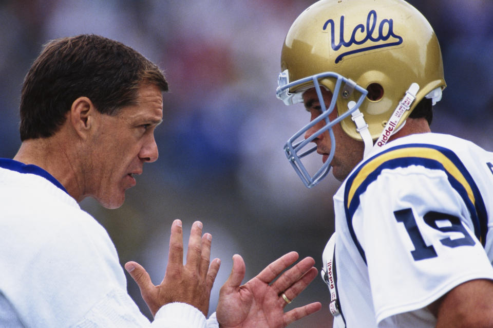 Terry Donahue, seen here with quarterback John Barnes in 1992, led the most succesful era of football in UCLA history. (Otto Greule Jr /Allsport/Getty Images)