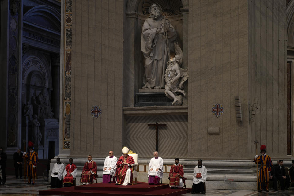 Pope Francis celebrates the Passion Mass on Good Friday, inside St. Peter's Basilica, at the Vatican, Friday, April 7, 2023. (AP Photo/Andrew Medichini)