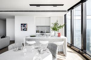 A marble kitchen within one of Australia 108's incredible apartments