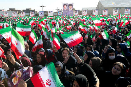 Women attend Iranian President Hassan Rouhani's public speech in the city of Khoy, West Azerbaijan province, Iran November 19, 2018. Official President website/Handout via REUTERS