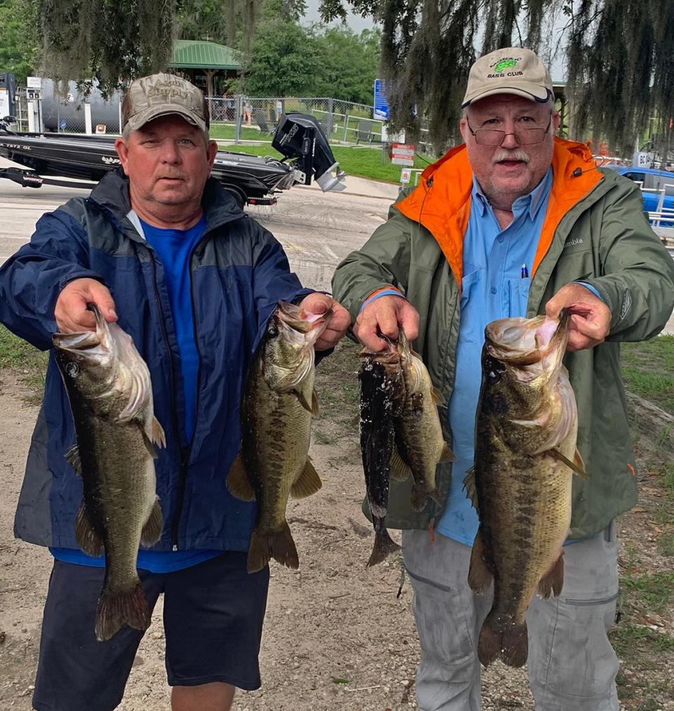 Charlie Becker, left, and Richard Blair had 19.76 pounds and had big bass with an 8.11 pounder to win the Mosaic Bass Club tournament June 11 at Lake Toho. 