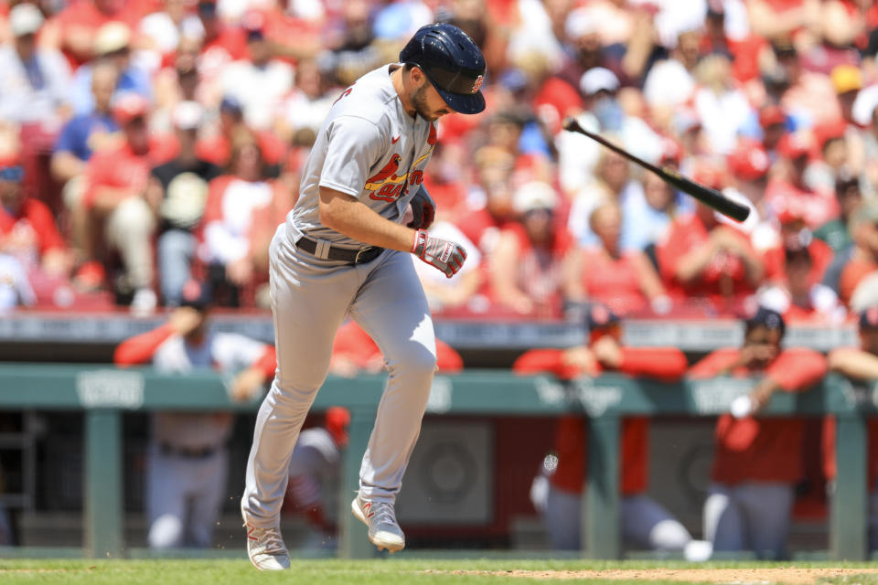 St. Louis Cardinals' Paul DeJong tosses his bat after drawing a walk during the eighth inning of a baseball game against the Cincinnati Reds in Cincinnati, Thursday, May 25, 2023. (AP Photo/Aaron Doster)